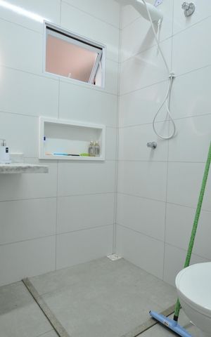 Casa à venda com 150m², 3 quartos e 2 vagasBanheiro da Suíte 1