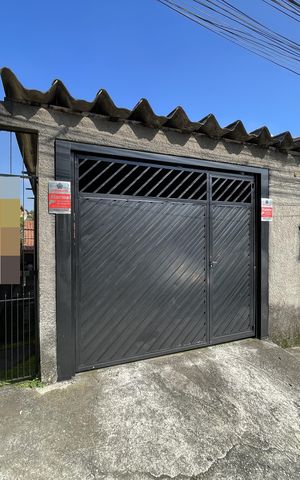 Casa à venda com 102m², 3 quartos e 4 vagas Casa à venda com 102m², 3 quartos e 4 vagasFachada+Placa