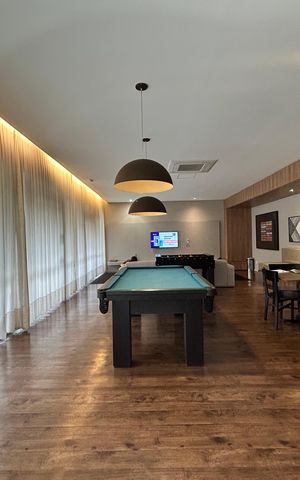 Apartamento à venda com 56m², 2 quartos e 1 vaga Apartamento à venda com 56m², 2 quartos e 1 vagaSalão de jogos