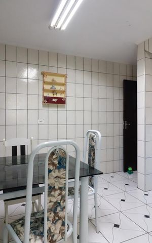Casa à venda com 130m², 2 quartos e 2 vagas Casa à venda com 130m², 2 quartos e 2 vagasCozinha