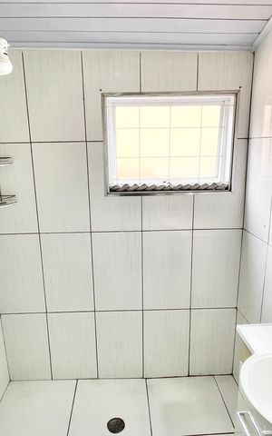 Casa à venda com 110m², 3 quartos e 1 vaga Casa à venda com 110m², 3 quartos e 1 vagaBanheiro da Suíte