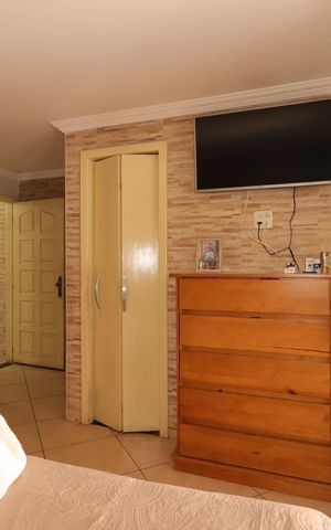 Casa para alugar com 300m², 3 quartos e 3 vagasSuíte
