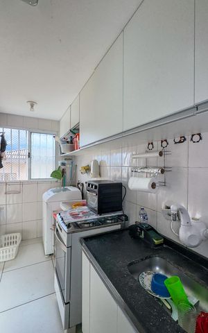 Apartamento à venda com 48m², 2 quartos e 1 vaga Apartamento à venda com 48m², 2 quartos e 1 vagaCozinha e Área de Serviço