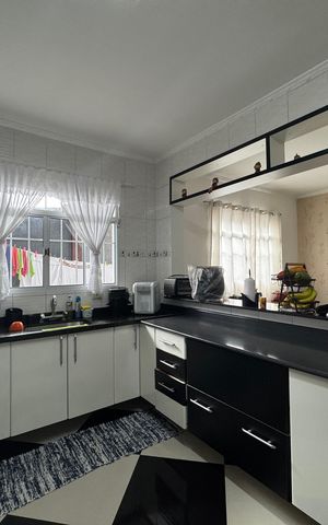 Casa à venda com 125m², 3 quartos e 2 vagas Casa à venda com 125m², 3 quartos e 2 vagasCozinha