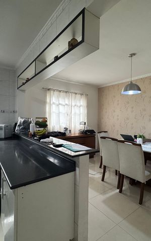 Casa à venda com 125m², 3 quartos e 2 vagas Casa à venda com 125m², 3 quartos e 2 vagasCozinha e Sala de Jantar