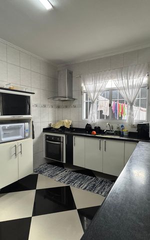 Casa à venda com 125m², 3 quartos e 2 vagas Casa à venda com 125m², 3 quartos e 2 vagasCozinha