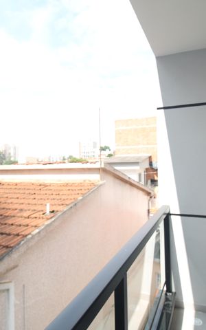 Casa à venda com 123m², 3 quartos e 2 vagasQuarto 1 - Varanda