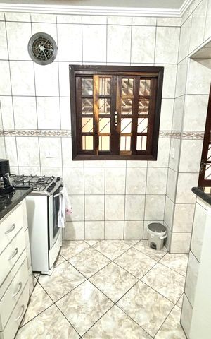 Casa à venda com 125m², 2 quartos e 2 vagas Casa à venda com 125m², 2 quartos e 2 vagascozinha