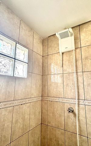 Casa à venda com 125m², 2 quartos e 2 vagas Casa à venda com 125m², 2 quartos e 2 vagasBanheiro do Quarto 1