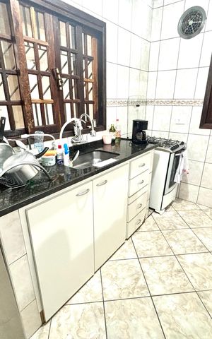 Casa à venda com 125m², 2 quartos e 2 vagas Casa à venda com 125m², 2 quartos e 2 vagascozinha