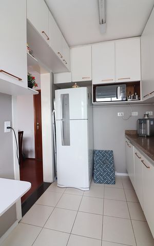 Apartamento à venda com 62m², 2 quartos e 1 vagaCozinha e Área de Serviço