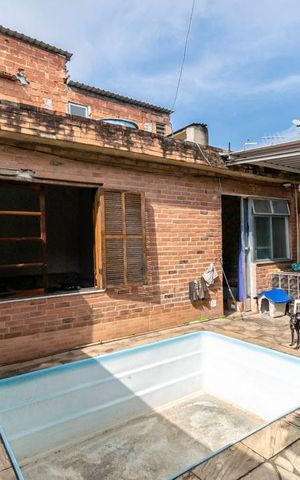 Casa à venda com 200m², 3 quartos e 3 vagas Casa à venda com 200m², 3 quartos e 3 vagasVaranda dos fundos