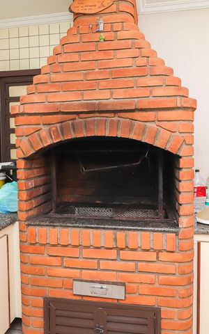 Casa à venda com 570m², 4 quartos e 10 vagasEspaço Gourmet - Churrasqueira