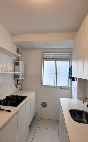 Apartamento à venda com 45m², 2 quartos e 1 vaga Apartamento à venda com 45m², 2 quartos e 1 vagaCozinha e Área de Serviço