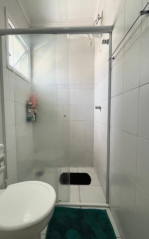 Casa de condomínio à venda com 95m², 3 quartos e 2 vagas Casa de condomínio à venda com 95m², 3 quartos e 2 vagasBanheiro da Suíte