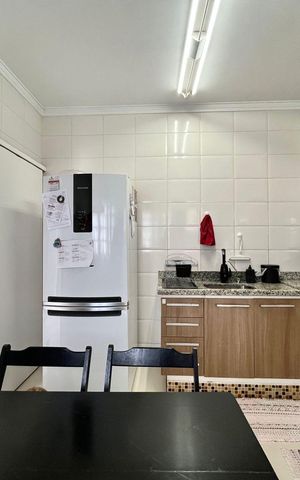 Casa de condomínio à venda com 95m², 3 quartos e 2 vagas Casa de condomínio à venda com 95m², 3 quartos e 2 vagasCozinha