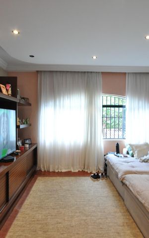Casa à venda com 405m², 3 quartos e 7 vagasSala