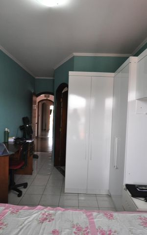 Casa à venda com 405m², 3 quartos e 7 vagasSuíte 2