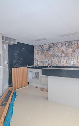 Casa à venda com 102m², 3 quartos e 2 vagas Casa à venda com 102m², 3 quartos e 2 vagasCozinha/Quintal/Churrasqueira