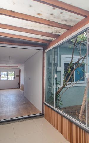 Casa à venda com 102m², 3 quartos e 2 vagas Casa à venda com 102m², 3 quartos e 2 vagasCozinha/Quintal/Churrasqueira