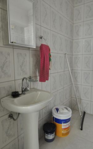 Casa à venda com 250m², 3 quartos e 9 vagasBanheiro da área do Salão de Festas