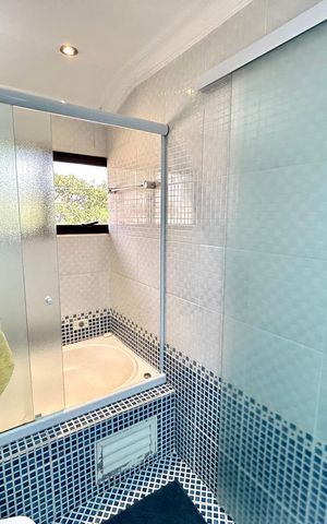 Casa à venda com 220m², 4 quartos e 3 vagas Casa à venda com 220m², 4 quartos e 3 vagasBanheiro da Suíte 1