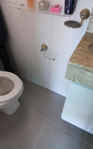 Casa de condomínio à venda com 120m², 3 quartos e 2 vagasBanheiro Social 2