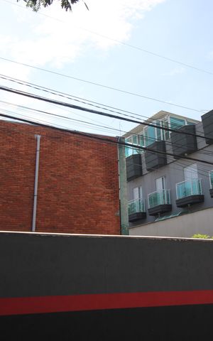 Casa de condomínio à venda com 120m², 3 quartos e 2 vagasVista Lateral do Prédio