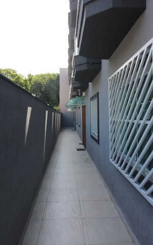 Casa de condomínio à venda com 120m², 3 quartos e 2 vagasCorredor Externo