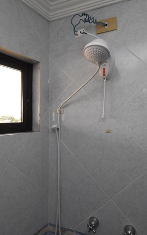 Casa de condomínio à venda com 450m², 3 quartos e 4 vagasBanheiro 2