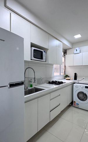 Apartamento à venda com 45m², 2 quartos e 1 vaga Apartamento à venda com 45m², 2 quartos e 1 vagaCozinha e Área de Serviço