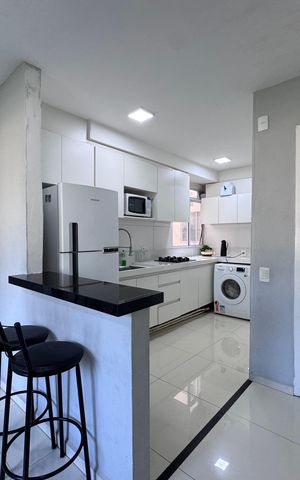 Apartamento à venda com 45m², 2 quartos e 1 vaga Apartamento à venda com 45m², 2 quartos e 1 vagaCozinha e Área de Serviço