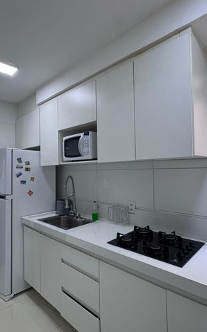 Apartamento à venda com 45m², 2 quartos e 1 vaga Apartamento à venda com 45m², 2 quartos e 1 vagaCozinha e Área de Serviço