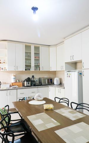 Casa à venda com 160m², 4 quartos e 2 vagas Casa à venda com 160m², 4 quartos e 2 vagasCozinha