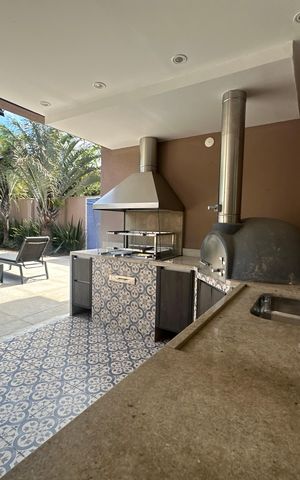 Casa de condomínio à venda com 498m², 3 quartos e 4 vagas Casa de condomínio à venda com 498m², 3 quartos e 4 vagasChurrasqueira