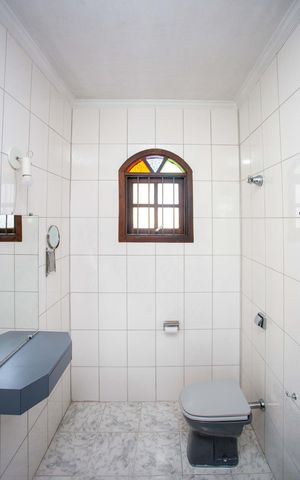 Casa à venda com 230m², 4 quartos e 3 vagasBanheiro da Suíte