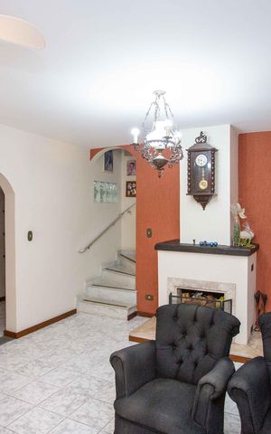 Casa à venda com 230m², 4 quartos e 3 vagasSala de TV