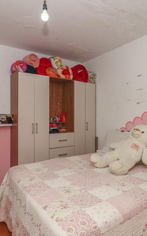 Casa à venda com 128m², 5 quartos e 1 vagaQuarto 4 / Casa 2