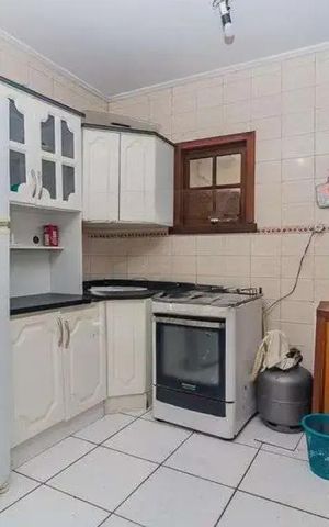 Casa à venda com 200m², 3 quartos e 2 vagas Casa à venda com 200m², 3 quartos e 2 vagasCozinha