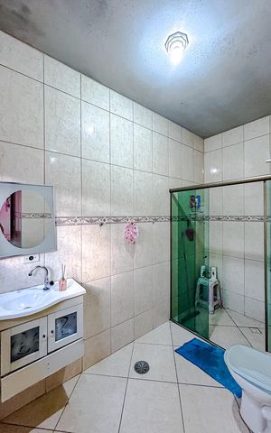 Casa à venda com 133m², 3 quartos e 4 vagasBanheiro da Suíte 2
