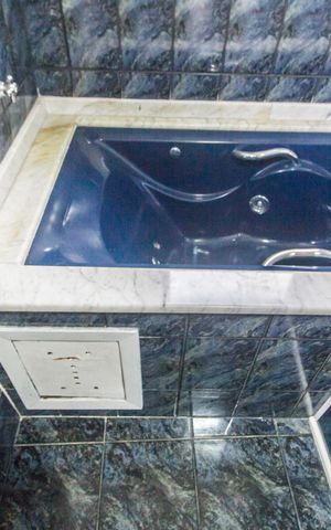 Casa de condomínio à venda com 387m², 4 quartos e 4 vagasBanheiro da Suíte