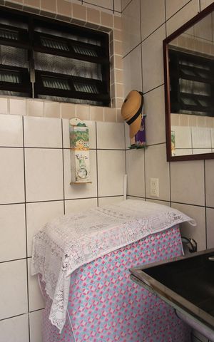 Casa de condomínio à venda com 61m², 2 quartos e 1 vagaÁrea de serviço