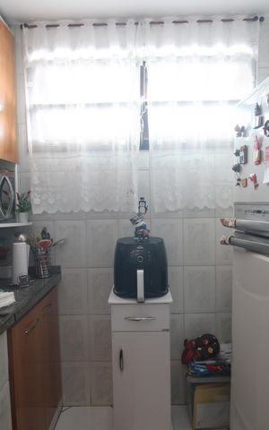 Casa de condomínio à venda com 61m², 2 quartos e 1 vagaCozinha