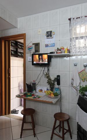 Casa de condomínio à venda com 61m², 2 quartos e 1 vagaCozinha