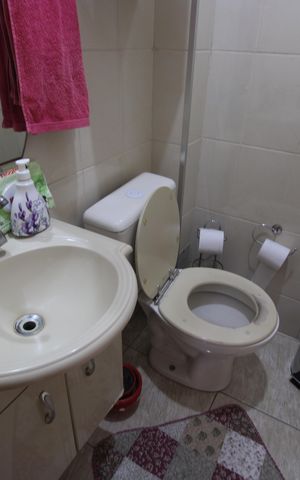 Casa de condomínio à venda com 61m², 2 quartos e 1 vagaLavabo