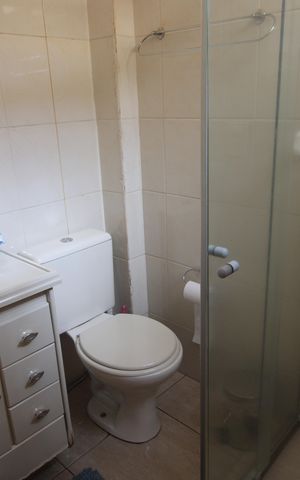 Casa de condomínio à venda com 61m², 2 quartos e 1 vagaBanheiro