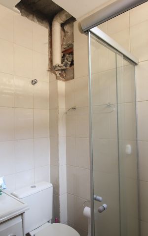 Casa de condomínio à venda com 61m², 2 quartos e 1 vagaBanheiro