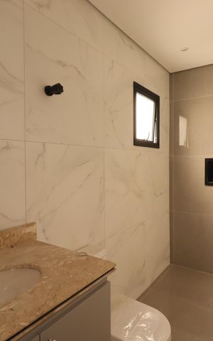 Casa à venda com 250m², 3 quartos e 3 vagasBanheiro da Suíte 1