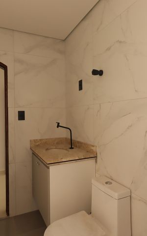 Casa à venda com 250m², 3 quartos e 3 vagasBanheiro da Suíte 1