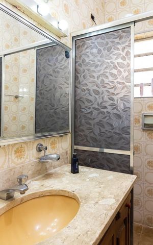 Casa à venda com 210m², 5 quartos e 2 vagasBanheiro 2